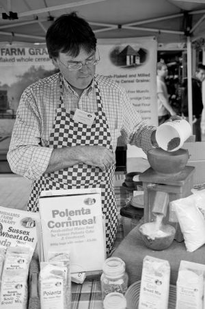 Trader from Imbhams farm at Lewes Farmer's Market 6th August 2011